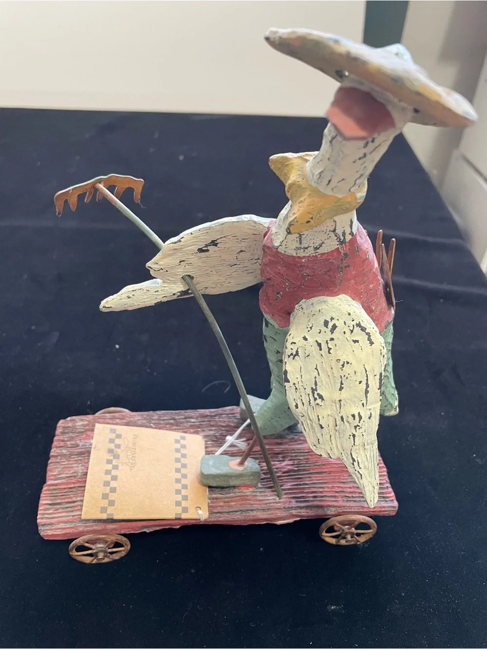Primatives by Kathy rustic design farmer duck on a cart